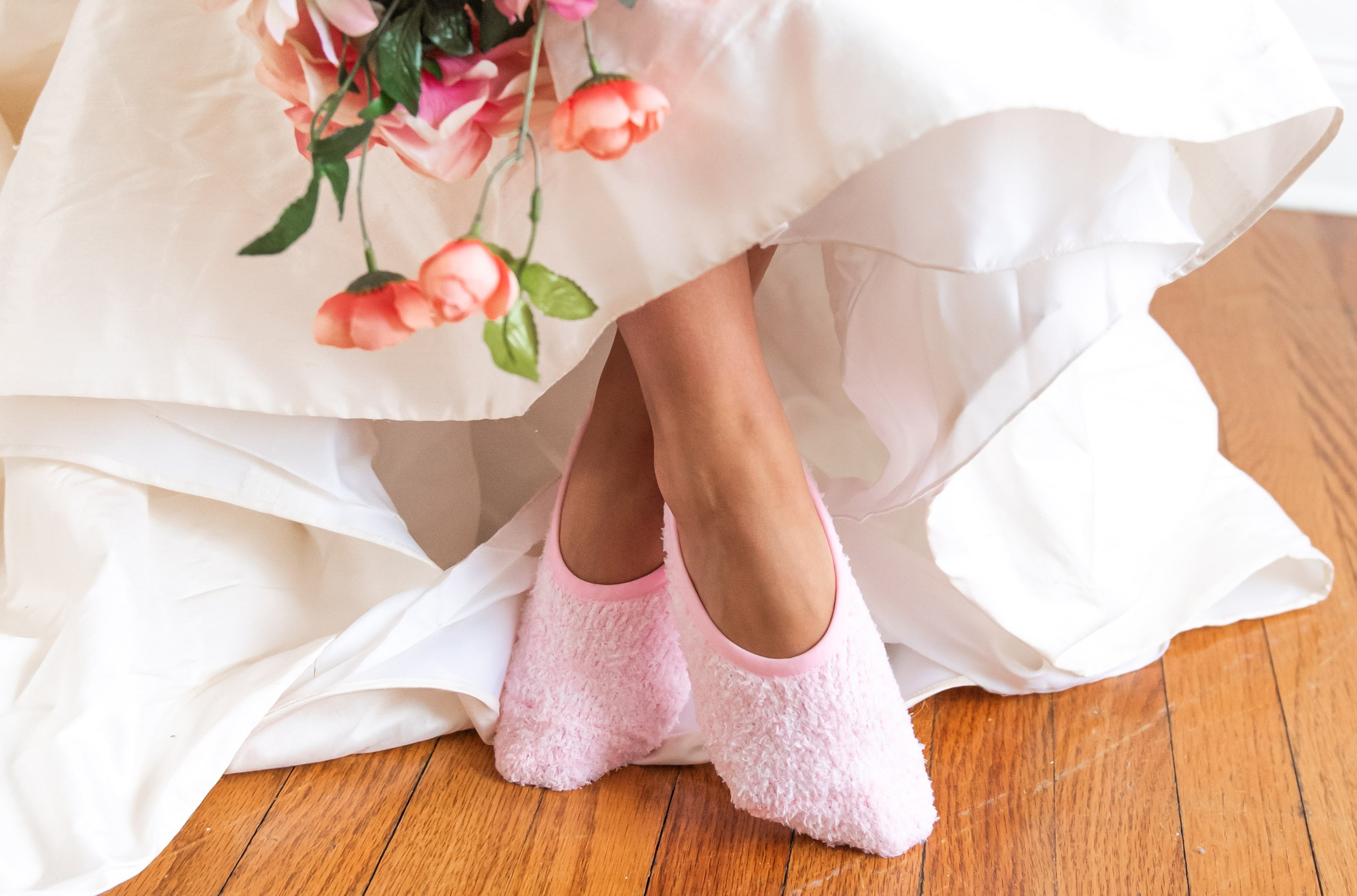 Person in White Wedding Dress Holding Flowers in Pink No Show Socks